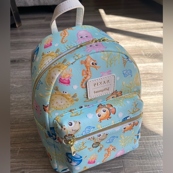 Loungefly Handbags - Disney Pixar Loungefly Finding Nemo backpack featuring your favorite fish NWT